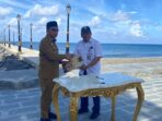 Bupati Bolmut Kunci Masa Depan Wisata Batu Pinagut Lewat MoU Pengelolaan Aset Pantai